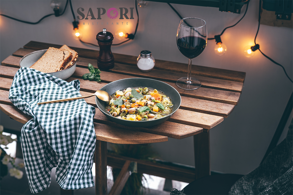 Elegant Italian dining table at Sapori Ristorante in Montclair with wine, pasta, and traditional dishes